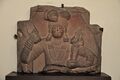 Yaksha holding mudgar and child. Art of Mathura, 100 BCE.[8]